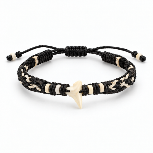 Display stand of woven bracelets threaded with shark teeth and beads