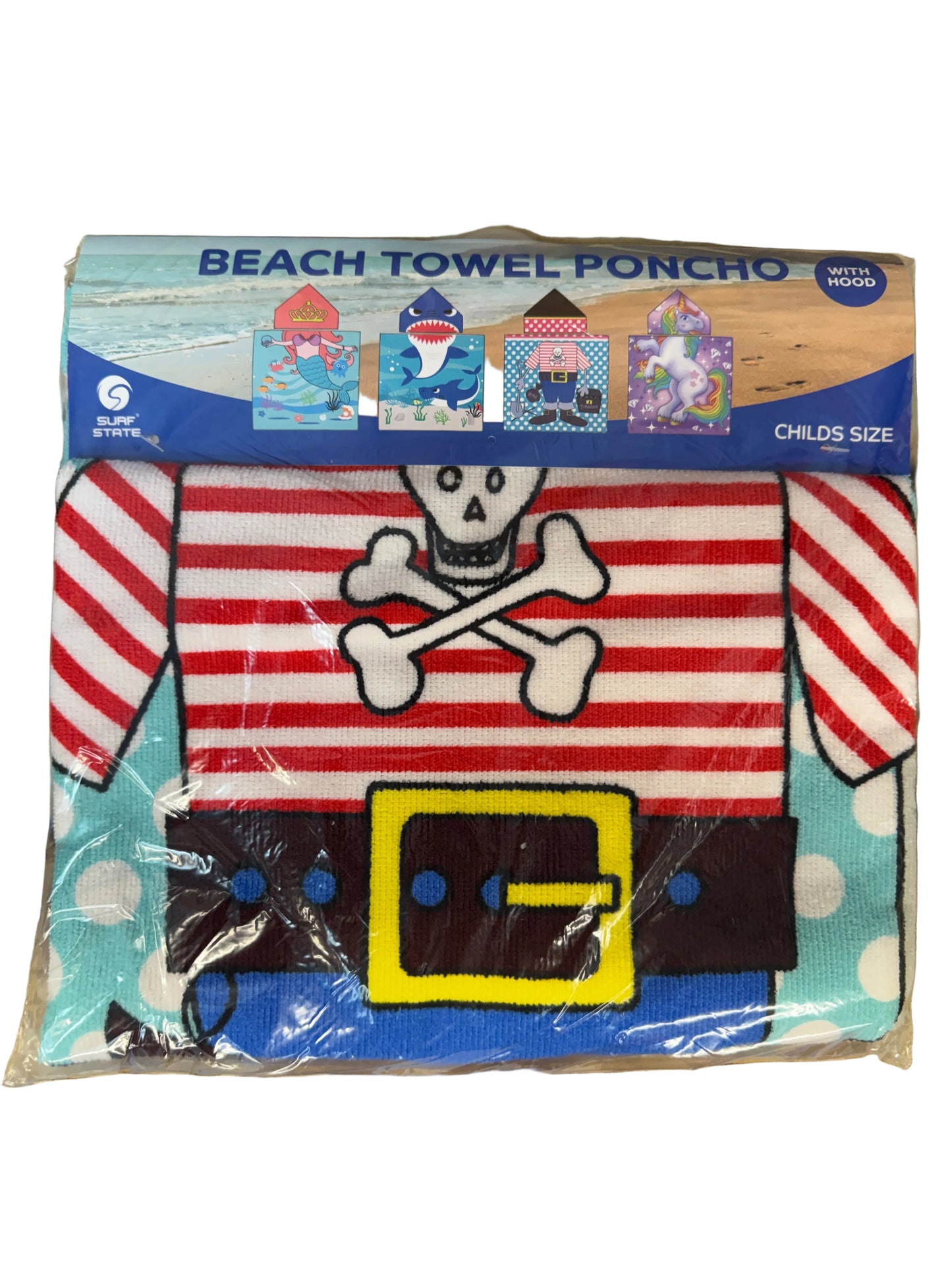 Pirate-themed beach towel poncho with packaging on a wooden surface