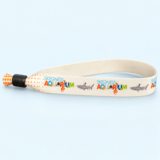 Fabric wristband printed with sharks and the Skegness Aquarium name